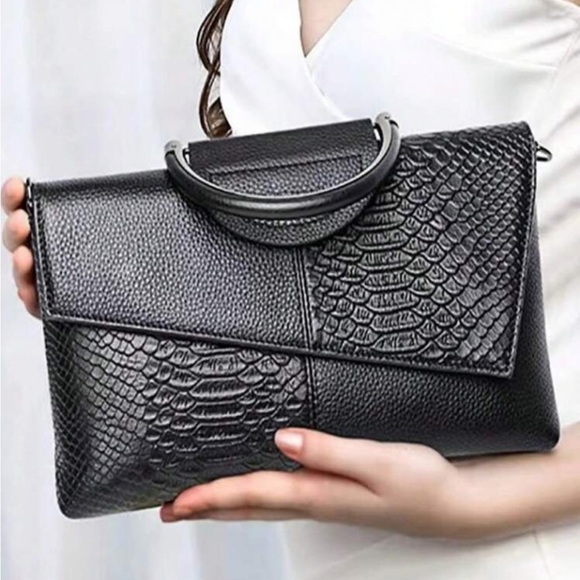 Luce vegan leather clutch